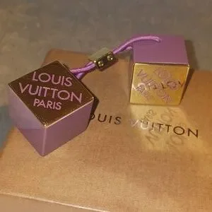 Louis Vuitton | Accessories | Louis Vuitton Cube Ponytail  display picture 1